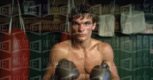 Retrato de un boxeador en un gimnasio, con guantes de boxeo y mirada seria. | CUADROS DE ATREZZO PARA CINE Y PUBLICIDAD